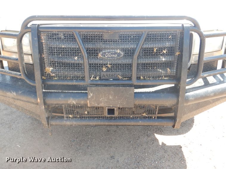 image for item FY9691 2004 Ford F350 Super Duty XLT Crew Cab utility bed pickup truck