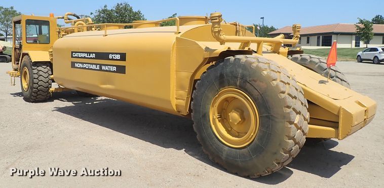 image for item DC1402 1979 Caterpillar 613B water wagon