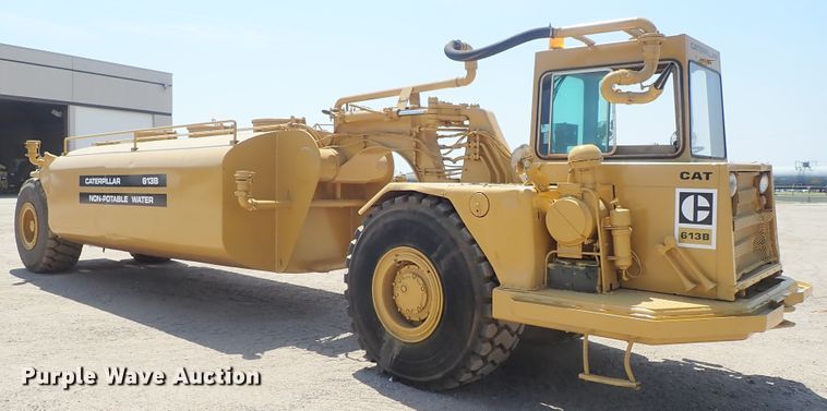 image for item DC1402 1979 Caterpillar 613B water wagon