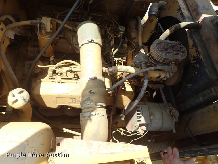 image for item DC1402 1979 Caterpillar 613B water wagon