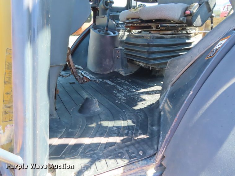 image for item DD6374 2006 John Deere 310SG backhoe