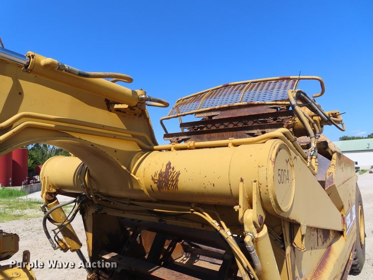 image for item DD6376 1999 Caterpillar 613C Series II elevating scraper