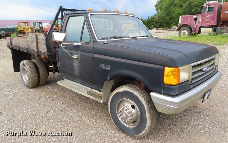 image for item DD6383 1990 Ford F450 Super Duty flat dump bed truck