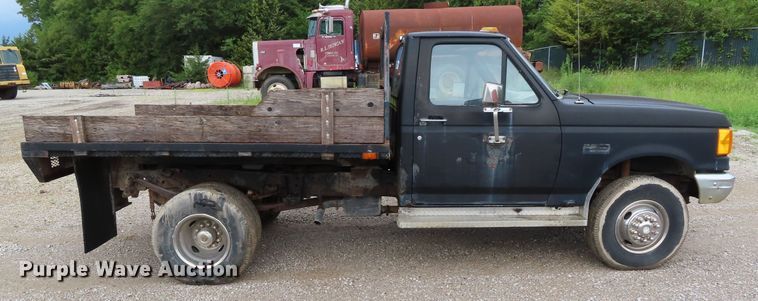 image for item DD6383 1990 Ford F450 Super Duty flat dump bed truck