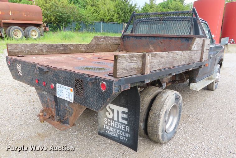image for item DD6383 1990 Ford F450 Super Duty flat dump bed truck