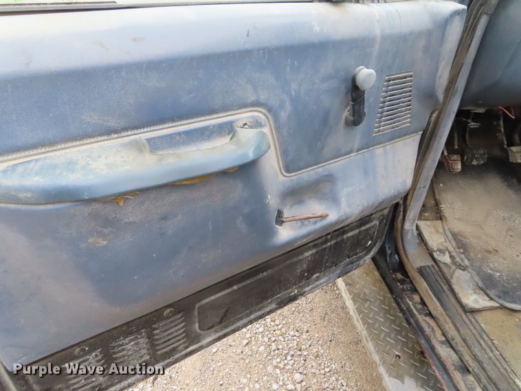 image for item DD6383 1990 Ford F450 Super Duty flat dump bed truck