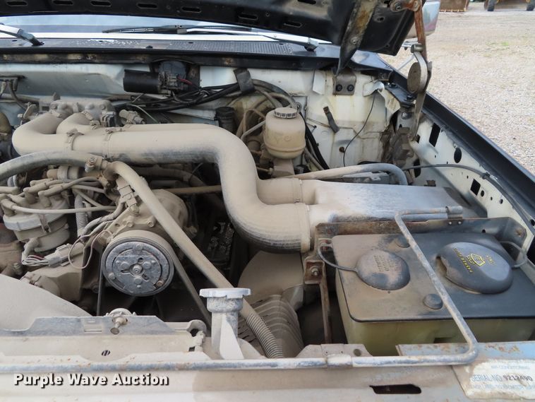 image for item DD6383 1990 Ford F450 Super Duty flat dump bed truck