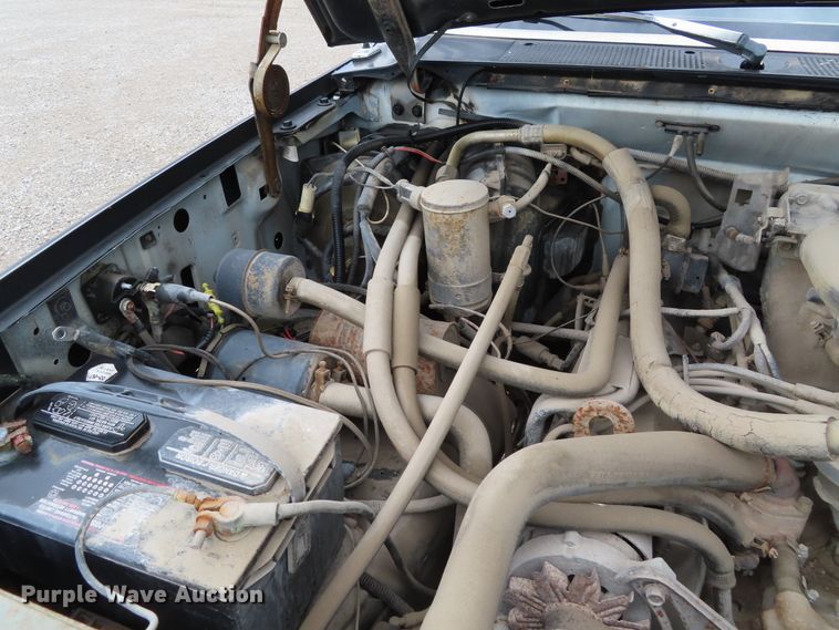 image for item DD6383 1990 Ford F450 Super Duty flat dump bed truck