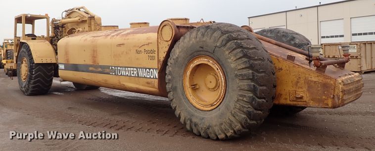 image for item DE5550 1976 Caterpillar 631D water wagon