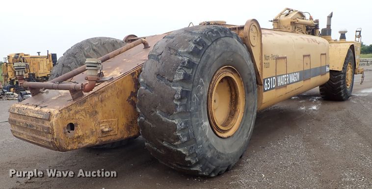 image for item DE5550 1976 Caterpillar 631D water wagon
