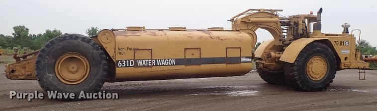 image for item DE5550 1976 Caterpillar 631D water wagon