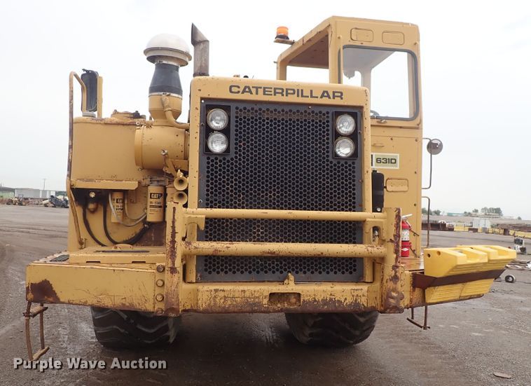 image for item DE5550 1976 Caterpillar 631D water wagon