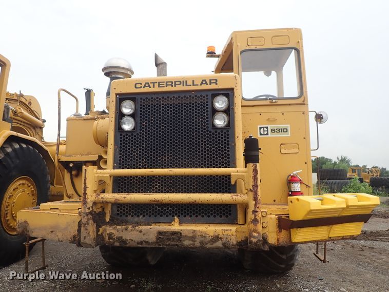 image for item DE5550 1976 Caterpillar 631D water wagon