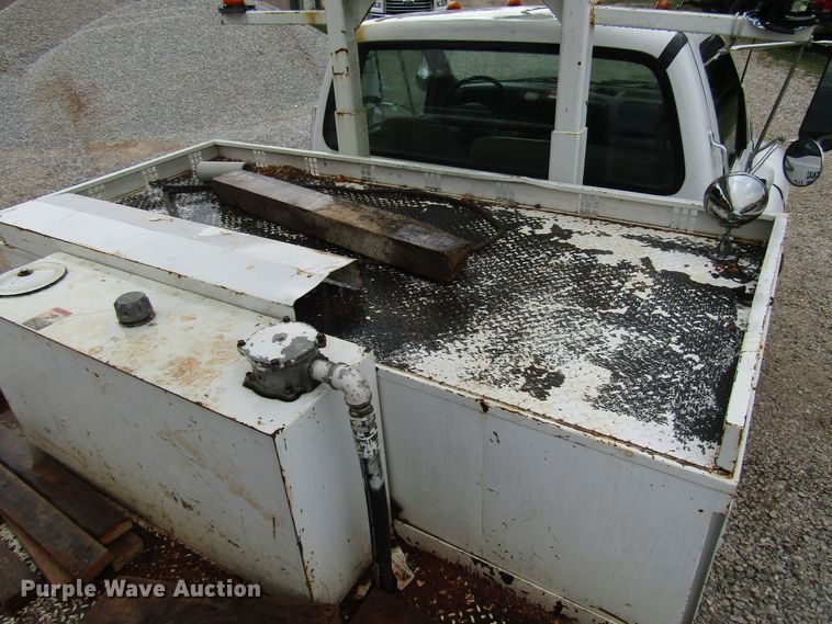 image for item DG1361 2004 Ford F750 Super Duty digger derrick truck