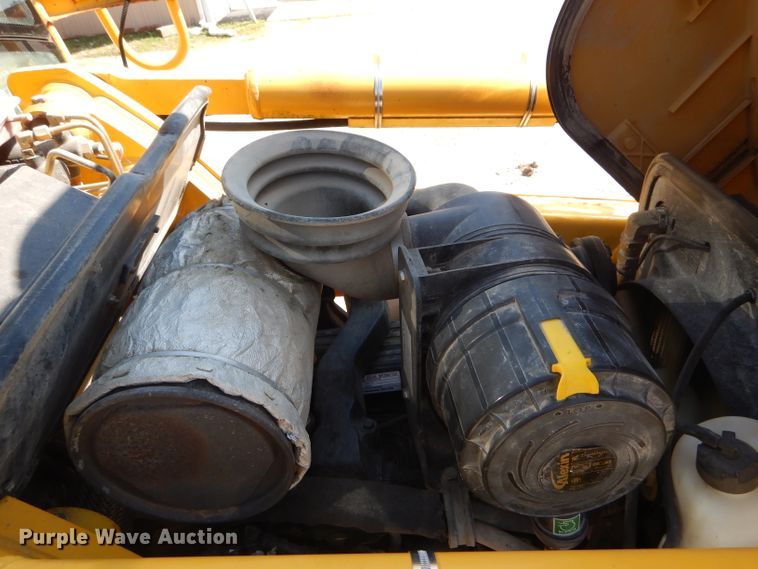 image for item DH6049 2003 Komatsu WB140-2N backhoe