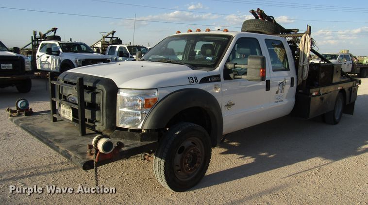 image for item DG1406 2016 Ford F550 Super Duty Crew Cab flatbed truck