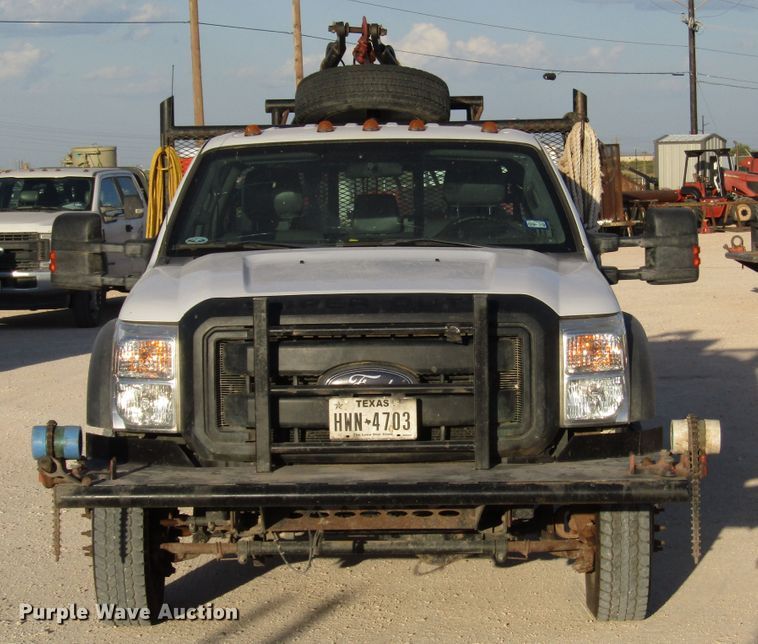 image for item DG1406 2016 Ford F550 Super Duty Crew Cab flatbed truck