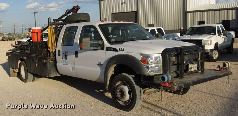 image for item DG1406 2016 Ford F550 Super Duty Crew Cab flatbed truck
