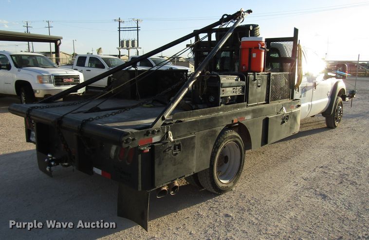 image for item DG1406 2016 Ford F550 Super Duty Crew Cab flatbed truck
