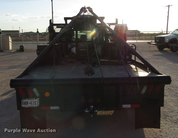 image for item DG1406 2016 Ford F550 Super Duty Crew Cab flatbed truck