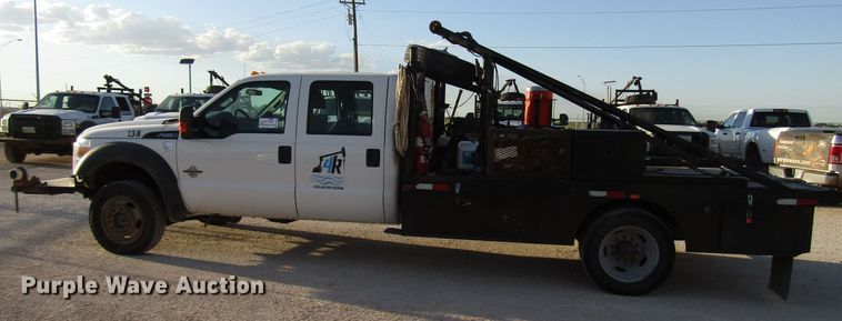 image for item DG1406 2016 Ford F550 Super Duty Crew Cab flatbed truck