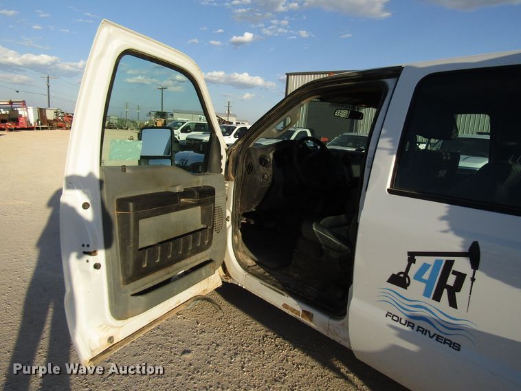 image for item DG1406 2016 Ford F550 Super Duty Crew Cab flatbed truck