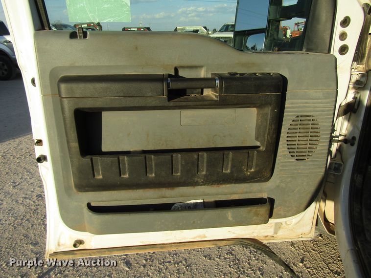 image for item DG1406 2016 Ford F550 Super Duty Crew Cab flatbed truck