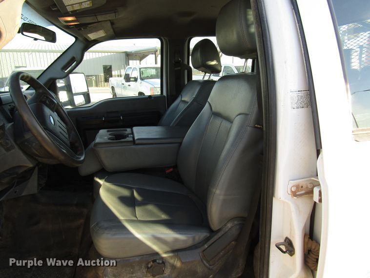 image for item DG1406 2016 Ford F550 Super Duty Crew Cab flatbed truck