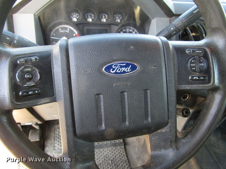 image for item DG1406 2016 Ford F550 Super Duty Crew Cab flatbed truck