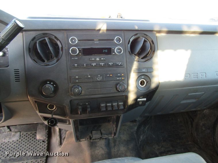 image for item DG1406 2016 Ford F550 Super Duty Crew Cab flatbed truck