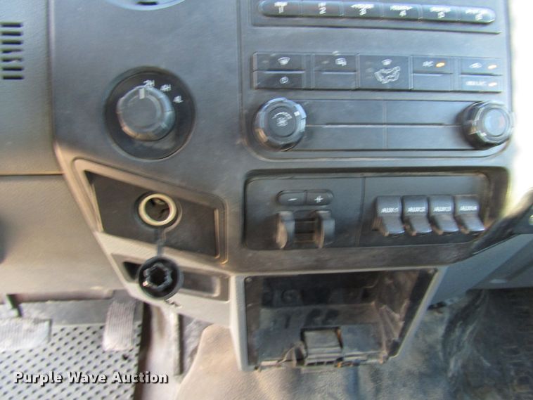 image for item DG1406 2016 Ford F550 Super Duty Crew Cab flatbed truck