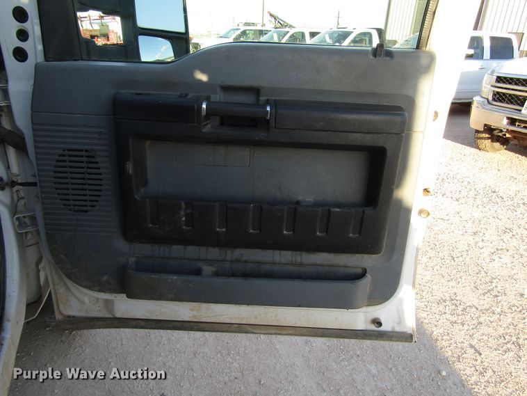 image for item DG1406 2016 Ford F550 Super Duty Crew Cab flatbed truck