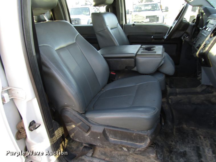 image for item DG1406 2016 Ford F550 Super Duty Crew Cab flatbed truck