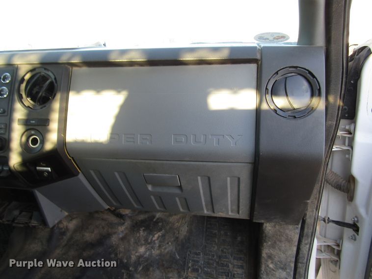 image for item DG1406 2016 Ford F550 Super Duty Crew Cab flatbed truck