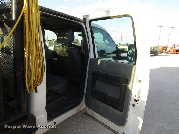 image for item DG1406 2016 Ford F550 Super Duty Crew Cab flatbed truck