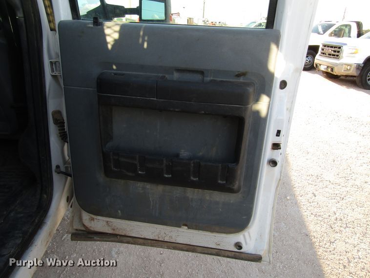 image for item DG1406 2016 Ford F550 Super Duty Crew Cab flatbed truck