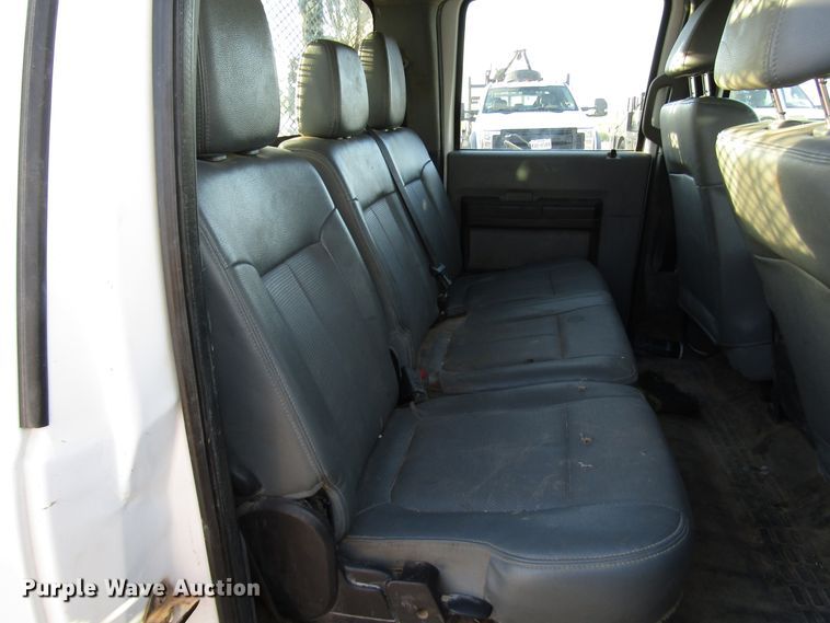 image for item DG1406 2016 Ford F550 Super Duty Crew Cab flatbed truck