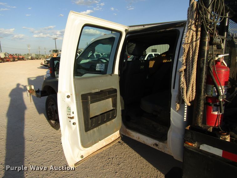 image for item DG1406 2016 Ford F550 Super Duty Crew Cab flatbed truck