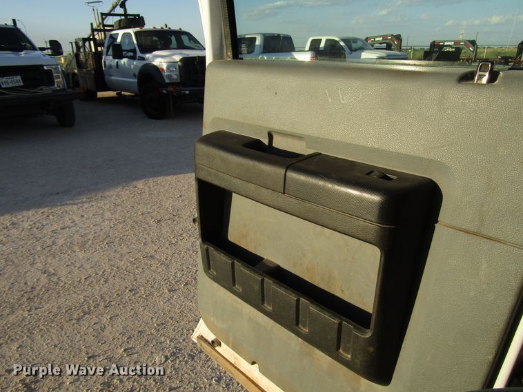 image for item DG1406 2016 Ford F550 Super Duty Crew Cab flatbed truck