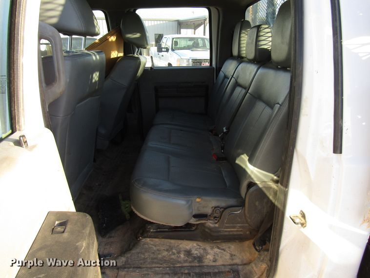 image for item DG1406 2016 Ford F550 Super Duty Crew Cab flatbed truck