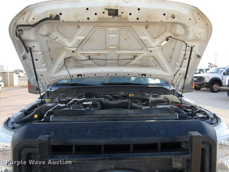 image for item DG1406 2016 Ford F550 Super Duty Crew Cab flatbed truck