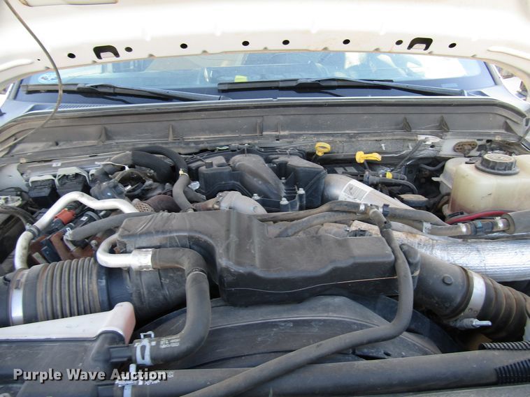 image for item DG1406 2016 Ford F550 Super Duty Crew Cab flatbed truck