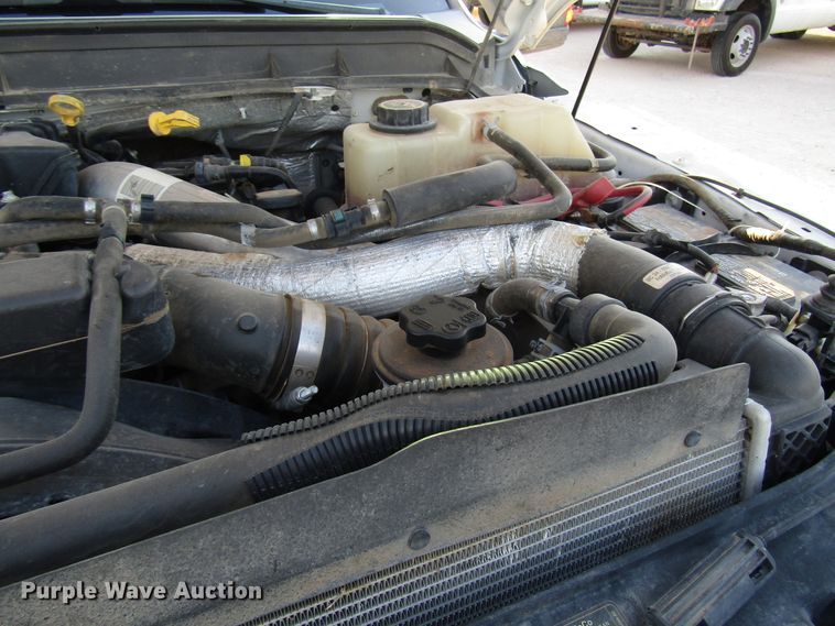 image for item DG1406 2016 Ford F550 Super Duty Crew Cab flatbed truck