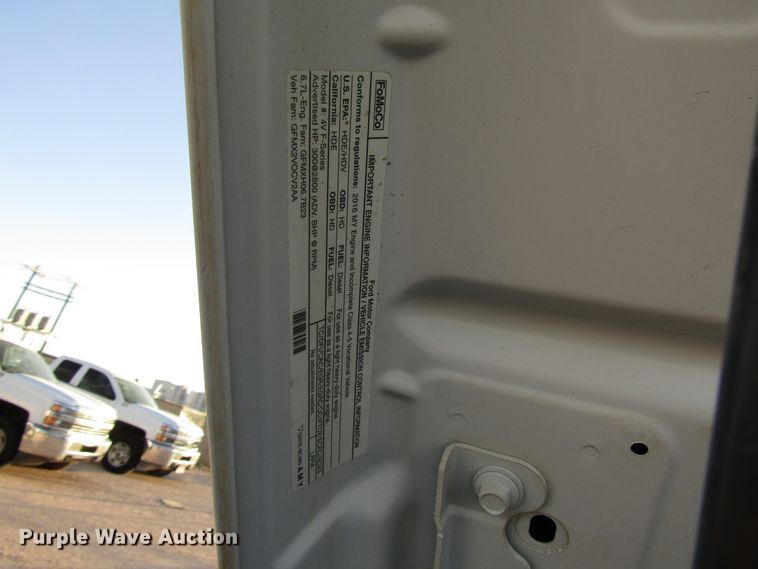 image for item DG1406 2016 Ford F550 Super Duty Crew Cab flatbed truck