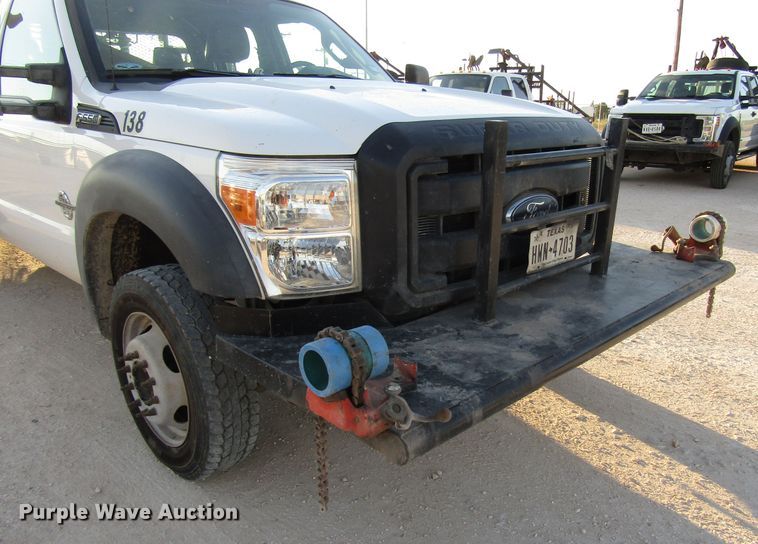 image for item DG1406 2016 Ford F550 Super Duty Crew Cab flatbed truck