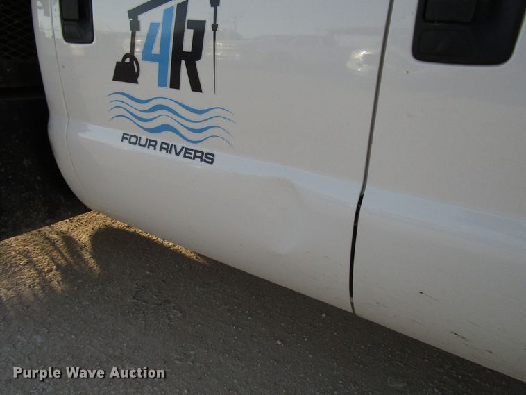 image for item DG1406 2016 Ford F550 Super Duty Crew Cab flatbed truck