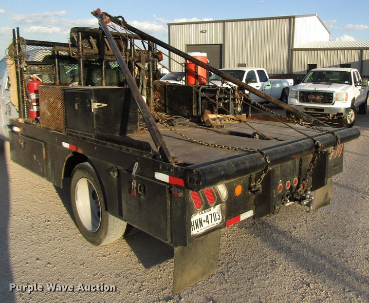 image for item DG1406 2016 Ford F550 Super Duty Crew Cab flatbed truck