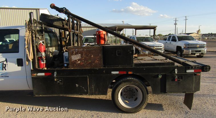 image for item DG1406 2016 Ford F550 Super Duty Crew Cab flatbed truck