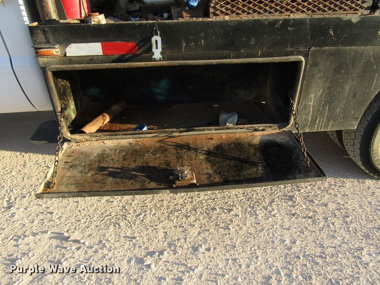 image for item DG1406 2016 Ford F550 Super Duty Crew Cab flatbed truck