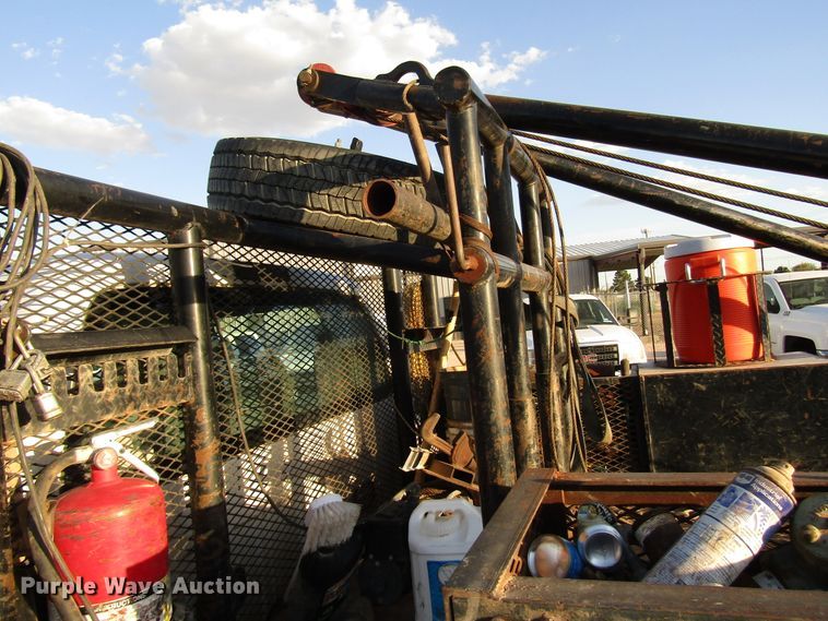 image for item DG1406 2016 Ford F550 Super Duty Crew Cab flatbed truck